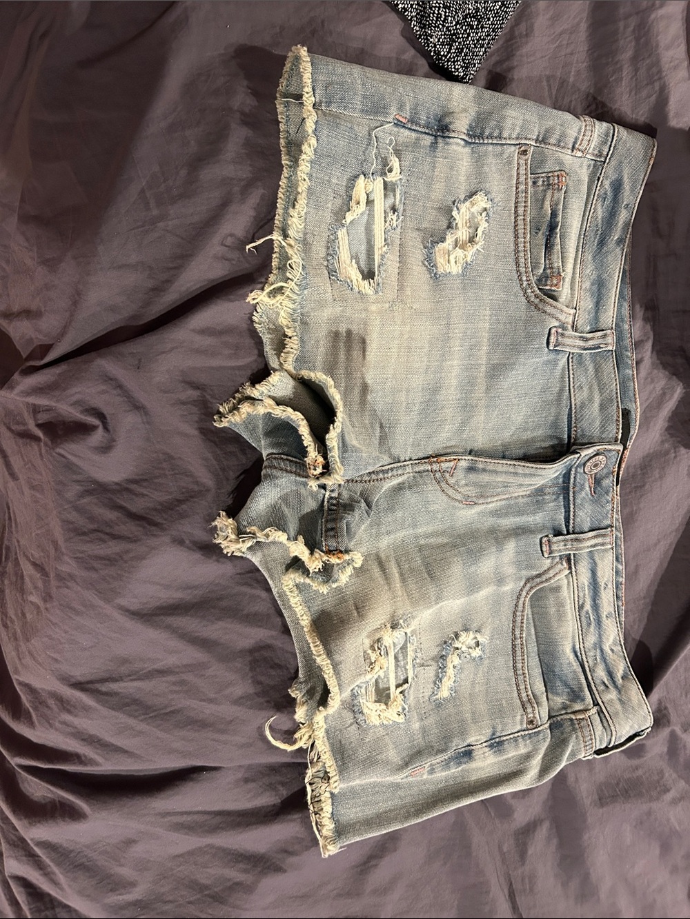 Distressed Light Blue Denim Cutoff Shorts